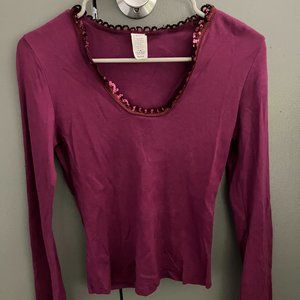Long bell sleeve top with sequined trim in magenta.  Size medium.